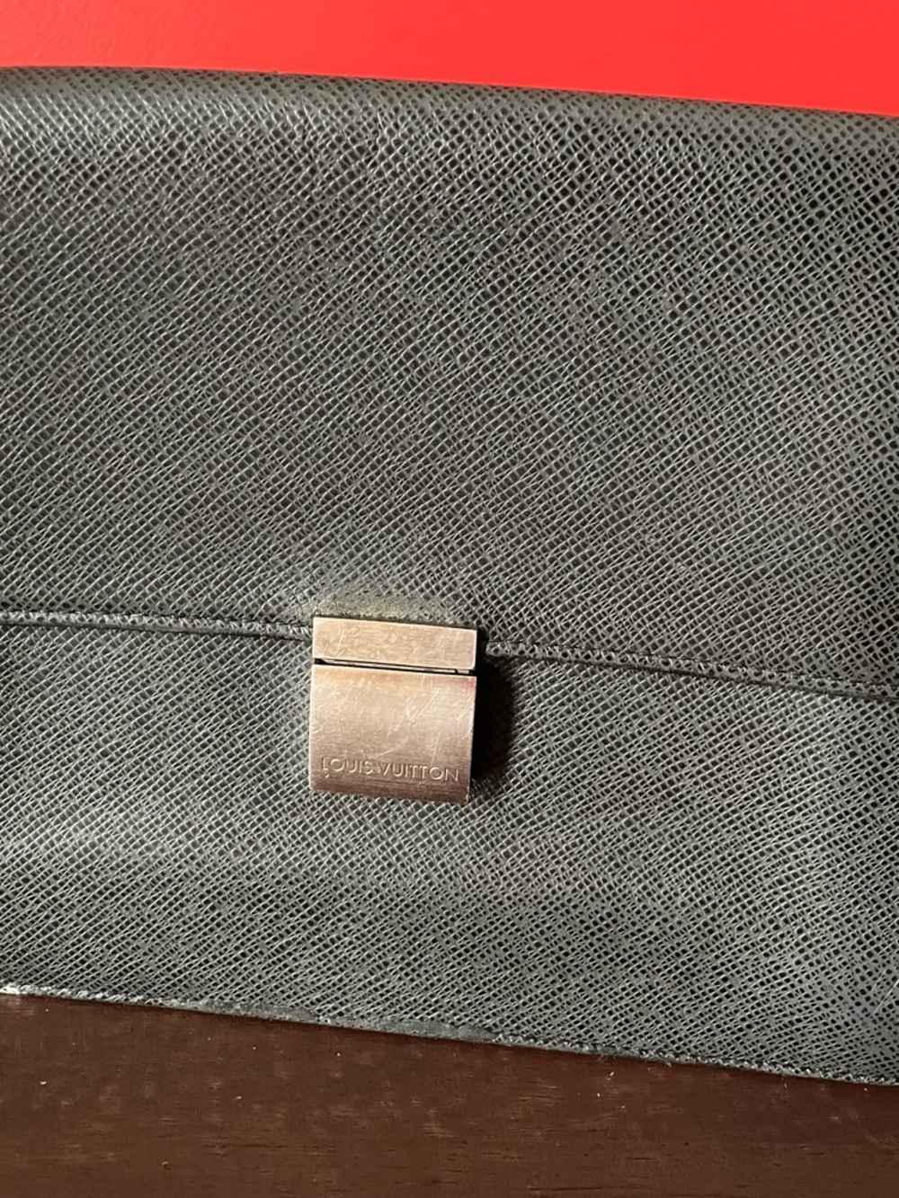Louis Vuitton Black Textured Leather Clutch with Silver Lock